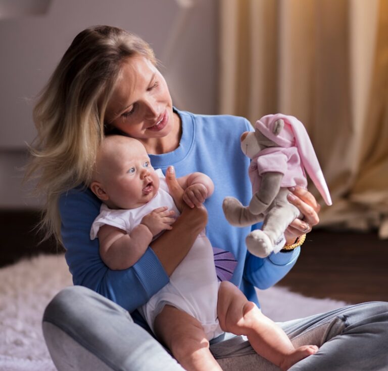a person holding a baby